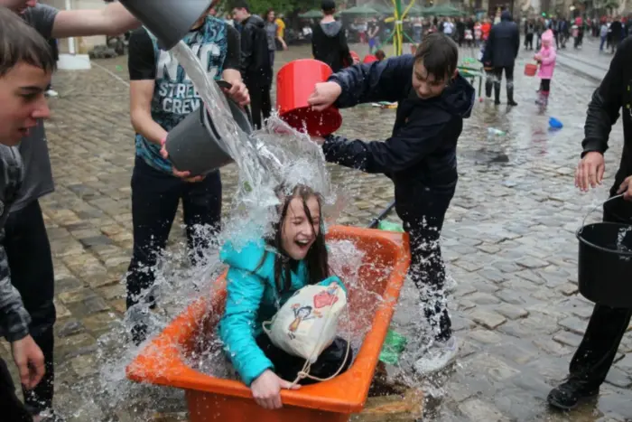 People happily splash each other