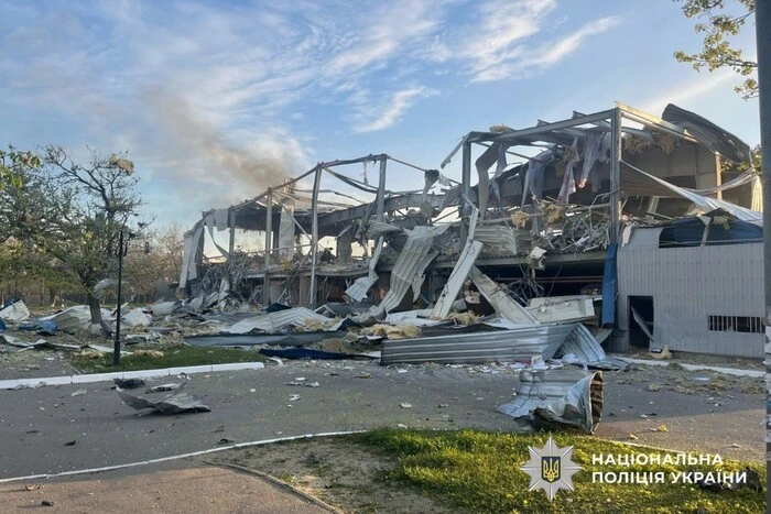 Destroyed ice arena and damaged houses