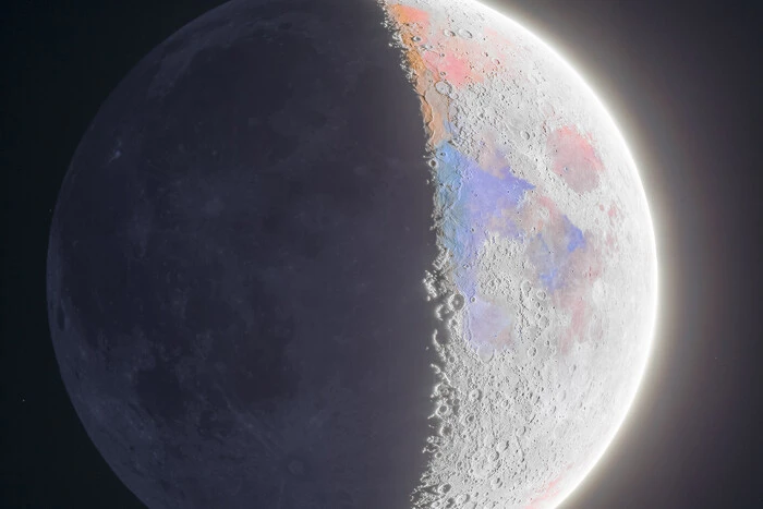 Amateur photographer photographing the Moon at night