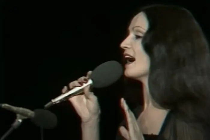 The poet-singer performs on stage