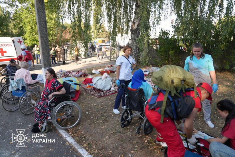 Youth playing football near the nursing home