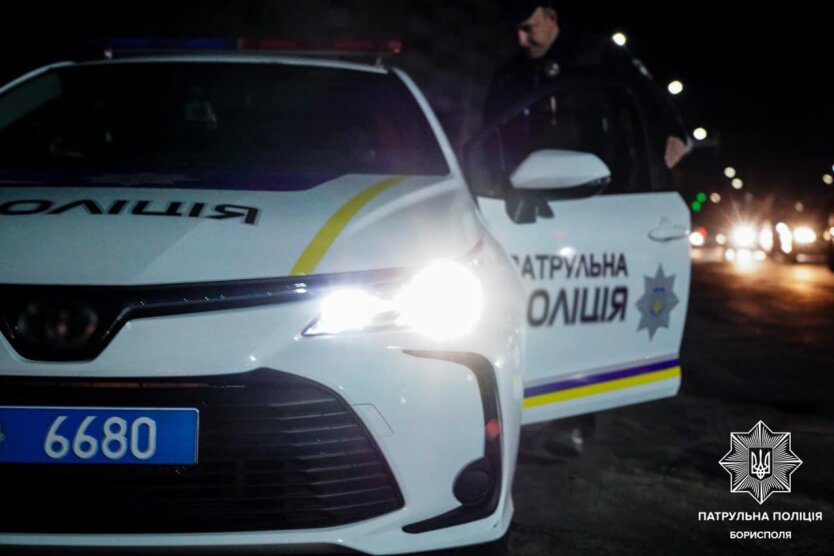 Police officer on the road with a magnifying glass