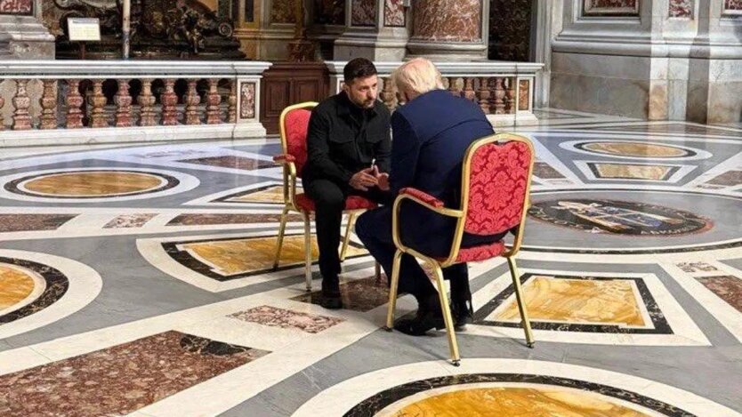 Two men attentively listen to each other
